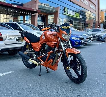 aqua disk: Sport üslublu kuzovlu, narıncı rəngdə küçə motosikleti. Aşağıdakılarla — 1