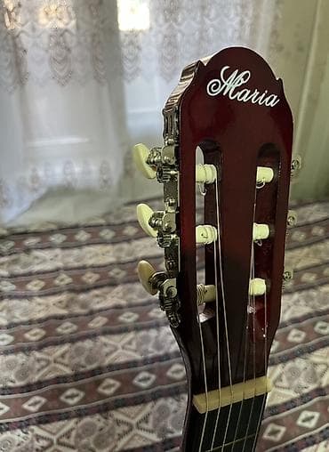 gitara sim: Maria markalı klassik gitara. Gitara ənənəvi klassik konstruksiyaya — 2