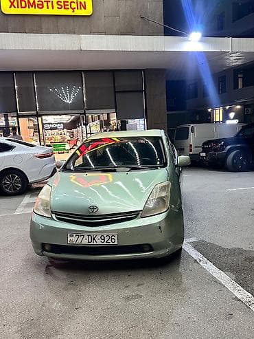 baqaj: Toyota Prius (2-ci nəsil) hibrid hetçbek - Gümüş-yaşıl rəngli kuzov — 1
