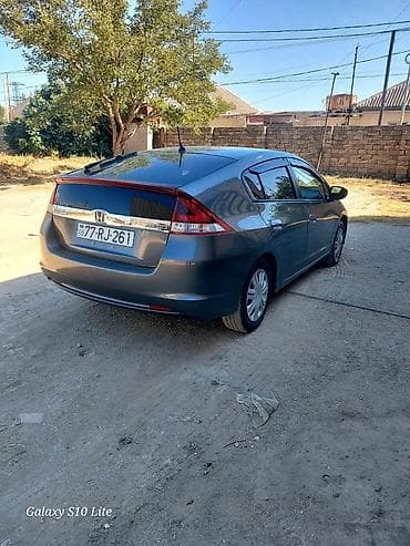 yarasa spoyler: Honda Insight: 1.3 l | 2014 il Hetçbek — 4