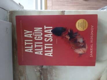 kaybolan yıllar 50 bölüm: Şamaxal Həsənov tərəfindən yazılmış, qırmızı üzlüklü "Altı Ay Altı Gün — 1