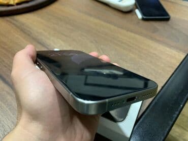 52 telefon: IPhone 15 Pro Max, 256 GB, Space Gray, Face ID — 2