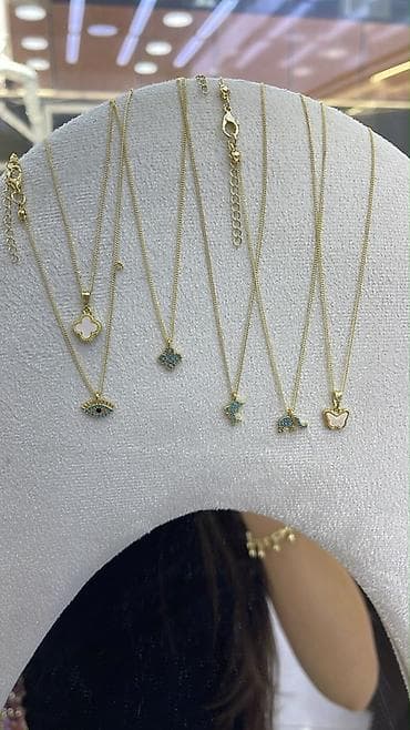 qulaq piercingi: 2-6azn Qızılı aksesuar dəsti – elegant və parlaq dizaynlar Məhsullar — 9