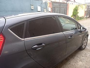 opel astra 2012: Ford Fiesta hatchback — tünd boz rəng, 5 qapı. Xüsusiyyətlər: - — 1