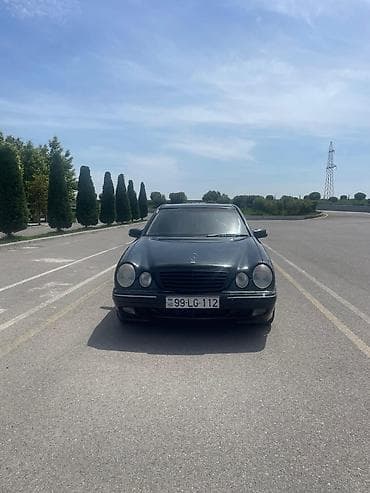 Mercedes-Benz E-Class (W210), sedan, qara rəng. il 1999 3.2 mator
