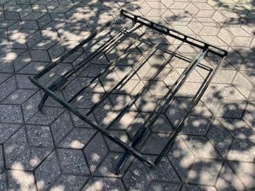 Ötürücü qutuların detalları: Avtomobil dam baqajı möhkəm metal konstruksiyaya malikdir. Bu baqaj — 1