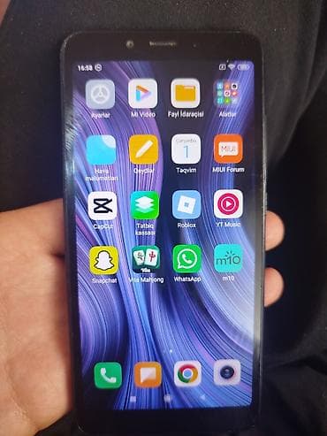 Xiaomi Redmi (MIUI interfeysi ilə) smartfon 50 Xüsusiyyətlər: - Ekran — 2