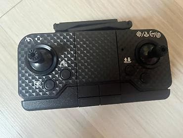 Qatlana bilən kvadrokopter dron dəsti real alıcıya satılır — 5