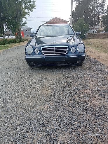 06 diskleri: Mercedes-Benz E-Class: 2.2 l | 1999 il Sedan — 1