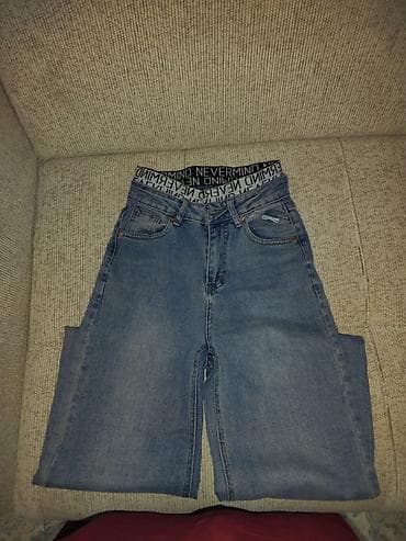 Geniş kəsimli mavi cins şalvar - Model: geniş balaqlı (flare) klassik