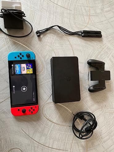 Nintendo Switch oyun konsolu – Neon Blue/Neon Red Joy-Con Komplekt: -