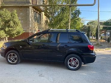 mitsubişi l 200: Mitsubishi Outlander, qara rəng, 5 qapılı krossover/SUV — 9