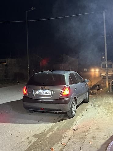 Kia Rio: 1.4 л | 2006 г. Хэтчбэк — 1