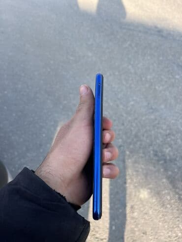 TV və video: Xiaomi Redmi smartfon Heç bir problemi yoxdur şəkildə göründüyü — 5