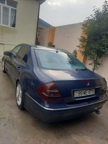 on panel: Mercedes-Benz E-Class: 2.7 l | 2002 il Sedan — 3