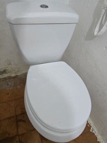 Santexnika: Ağ rəngli unitaz. Bu unitaz hamam otaqları üçün uyğundur. Modern və — 1