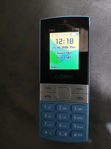 pulsuz mp3 yukle: CORN C100 düyməli mobil telefon - Rəng: mavi korpus, gümüş rəngli — 2
