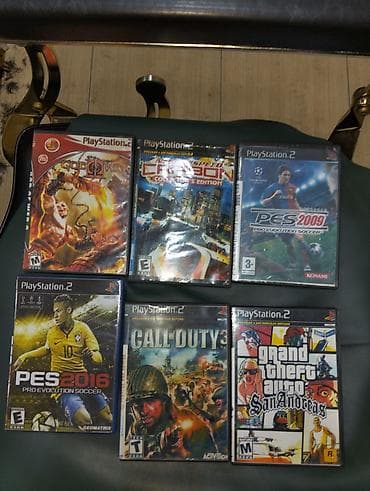 PlayStation 2 (PS2) komplekti - Konsol: Sony PlayStation 2 Slim (üst