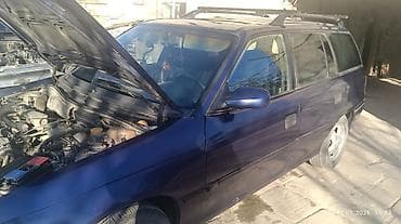 audi 100 2 d: Opel Astra F Caravan – universal kuzovlu, mavi rəng. Texniki və — 4
