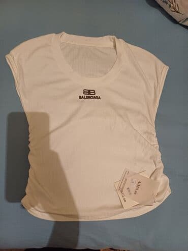 quzu derisinden papaq: Balenciaga loqolu qadın köynəyi. standartdır. İncə xanımlara gözəl — 1
