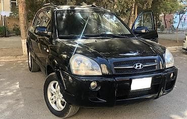 Hyundai Tucson: 2 л | 2008 г. Кроссовер