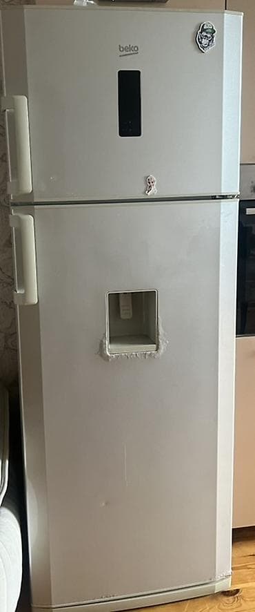 soyuducu topdan satis: İşlənmiş 2 qapılı Beko Soyuducu Satılır, rəng - Gümüşü, Dispenserli — 1