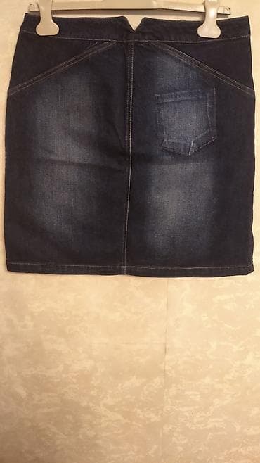Denim ətək – tünd göy, mini/orta uzunluq. Xüsusiyyətlər: - Kəsim — 6