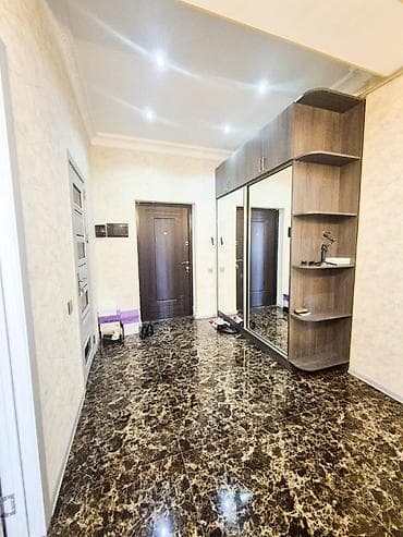 Nizami rayonu, Qara Qarayev metrosunun çıxışı, yeni tikili, 19 — 10