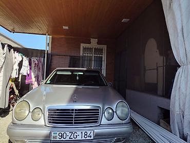 mersedes satilir: Mercedes-Benz E-Class (W210) sedan - Kuzov: gümüş rəngli sedan — 7