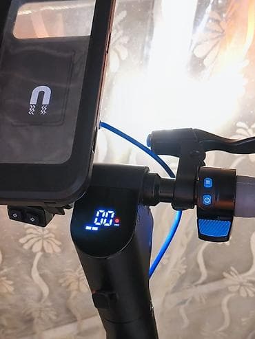 Nəqliyyat: Skuter Rs pro 1 suret 25. Tam dolu zaryatqa ile 25 km yol gedir Ela — 5