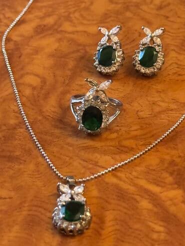 1 qram qizilin qiymeti: Dəstə daxildir: Bilərzik, Boyunbağı, Kulon — 2