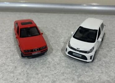 mini disk: Model avtomobil – qara sedan - Miqyas: təxmini 1:32–1:36 (kompakt — 6