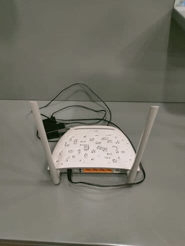 Kompüter və noutbuk aksesuarları: Cox az istifadə edilmiş TP Link wifi ADSL modem satılır. Yeni kimidir — 1