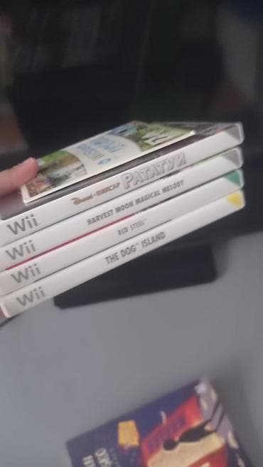 ps5 alan yerler: Nintendo Wii oyun konsolu paketi Komplekt: - Ağ rəngli Nintendo Wii — 4