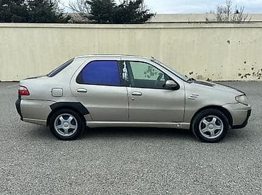 şam diskilər: Fiat Albea sedan - Kuzov: 4 qapılı sedan, bej rəng (bəzı hissələrdə — 6