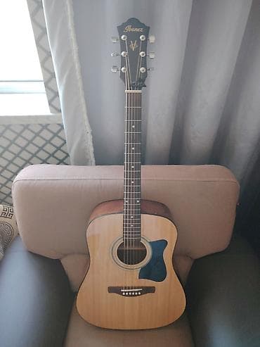 cat kabel: İbenez akustik gitara içində modeli yazilib işlənme müddəti 8-9 aydi — 2
