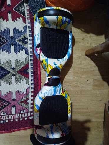 elektrik scoter: Elektrik hoverboard (gyroskuter) - Rəngarəng, komiks üslublu korpus — 1