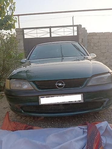 suru: Opel Vectra: 1.6 l | 1996 il Sedan — 1