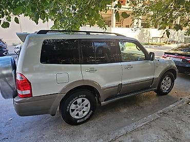 mitsubishi eclipse: Mitsubishi Pajero (3-cü nəsil) 5 qapı SUV - Rəng: ağ/mirvari - — 2