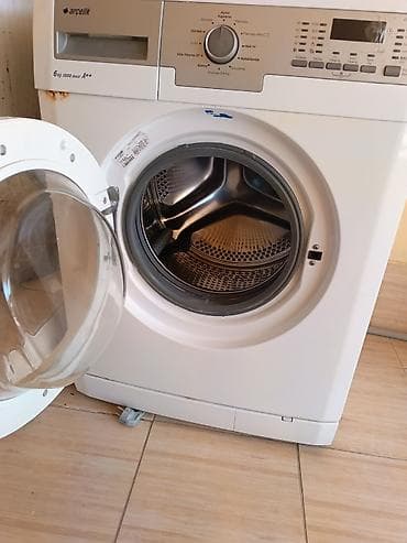 su arıtma: Arçelik paltaryuyan maşın – 6 kq, 1000 dövr/dəq, A++ enerji sinfi — 2