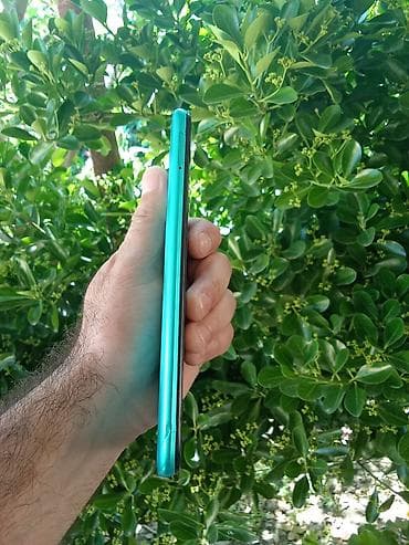 goy su: Redmi 9T, 64 GB, rəng - Göy, Barmaq izi, Face ID — 6