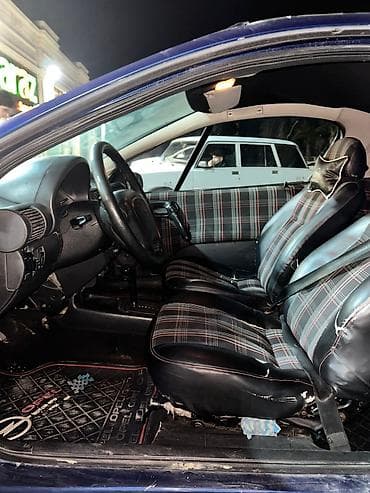 islenmis teker satisi: Opel Tigra: 1.6 l | 1997 il 30000 km Sedan — 6