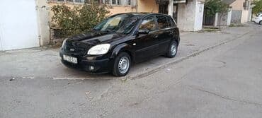 Avtomobil alışı: Kia Rio hatchback (qara rəng), 5 qapılı şəhər avtomobili. Xarici: - — 2
