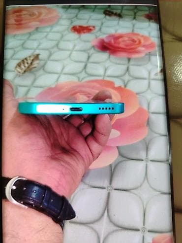 asus telefon qiymeti: Məhsul: Mavi rəngli smartfon Xüsusiyyətlər və dizayn: - Kənarları — 3