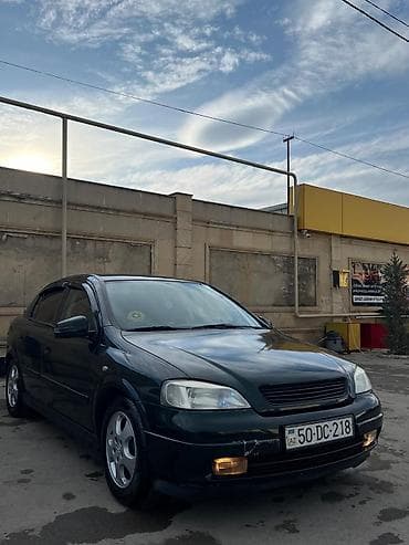 Model: Opel Astra G sedan Kuzov: 4 qapı, tünd yaşıl rəng Mühərrik və