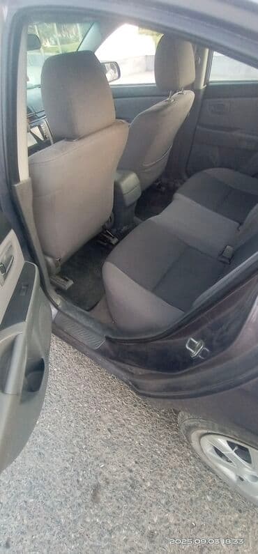 hediye qutusu: Mazda 3: 1.6 l | 2008 il Sedan — 7