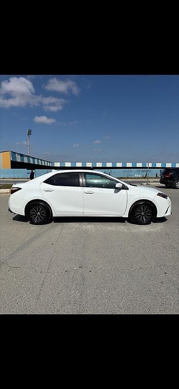 Toyota Corolla, ağ rəng,sedan gövdə. I - Nömrə nişanı: 99-KY-573 — 9