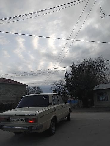 Motonəqliyyat: VAZ 2106 sedan - Kuzov: beşqapılı sedan, açıq bej rəng - Mühərrik — 3