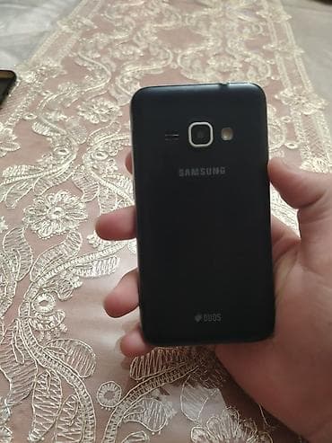a50 ekranı: Samsung Galaxy J1 2016, 16 GB, rəng - Qara, İki sim kartlı — 1