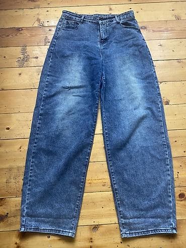 Yüksək belli, geniş kəsimli mavi cins şalvar - Model